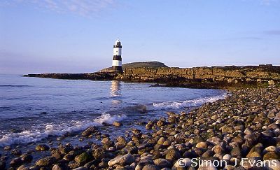Beach and lighthouse at Penmon, Anglesey (Ynys Mon)
