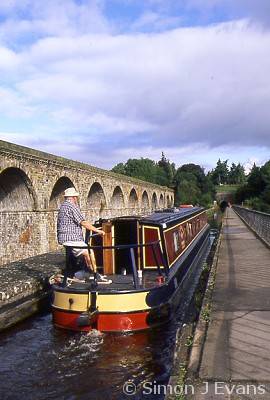 Canalboat on Chirk aqueduct, part of the Llangollen branch of the Shropshire Union Canal