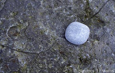 Blue stone on a rock